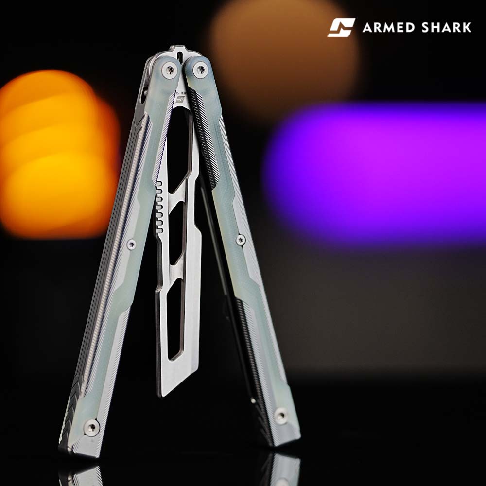 Armed Shark Ajax Series trainer showing top profile with red handle accents
