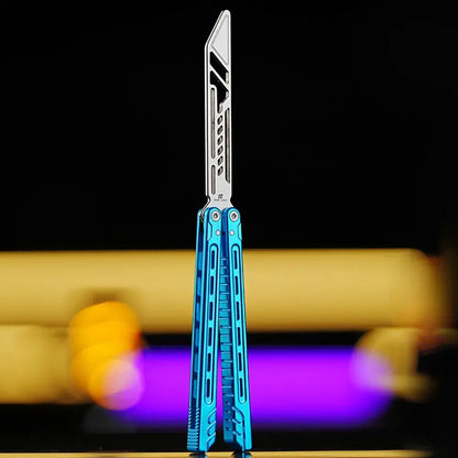 Armed Shark Athena Balisong Trainer in anodized blue finish, fully open position with polished training edge and vivid studio background