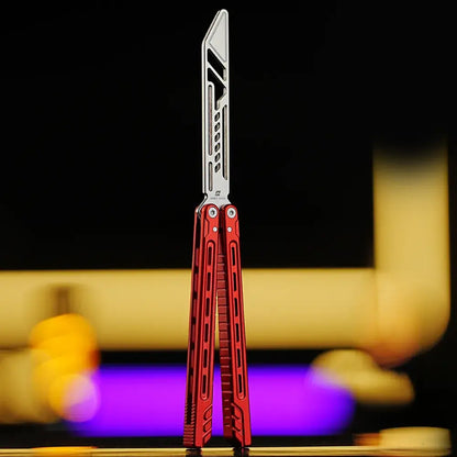 Front view of Armed Shark Athena Balisong Trainer in red, fully open position showing CNC-machined handles and polished stainless training edge under warm studio lighting
