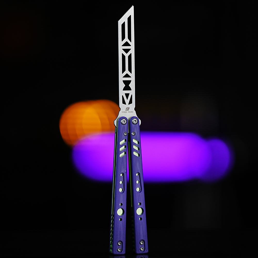Armed Shark REP Balisong Butterfly Trainer Knife V2 with purple handle and green accent liners – safe unsharpened practice knife.