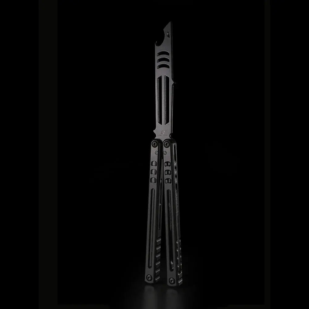 Armed Shark Titanium Inked Mako Bottle Opener Trainer in full open position with matte black finish under dark studio lighting