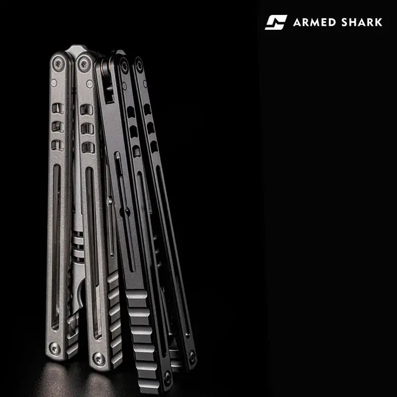 Armed Shark Titanium Inked Mako Bottle Opener Trainers in silver and black finishes displayed at a closed-angle view under studio lighting