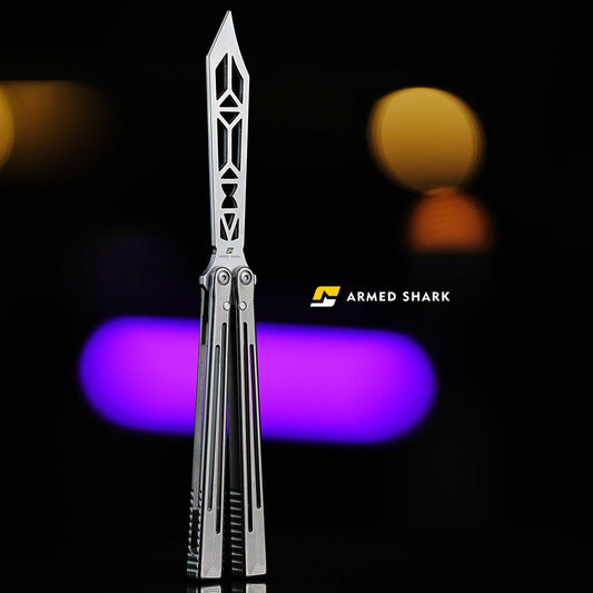 Armed Shark Titanium REP balisong trainer front view with geometric cutout blade